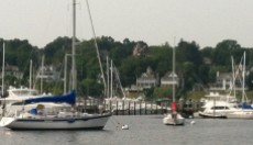 The handsome waterfront homes of Atlantic Highlands, NJ, keep watch on the harbor full of yachts.