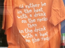 Words of wisdom as offered in a window of the shop nearest Rockport Town Dock.