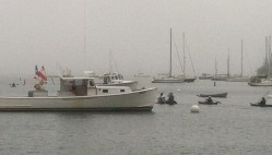 Undeterred by fog, competitors assemble for the Long Cove Regatta.