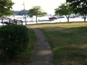 The typically quaint shopping district, including super market, is just up this path from the harbor.