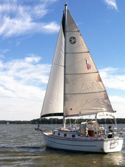 With a favorable tide, it doesn't take much wind to sail the muddy water of Elk River.