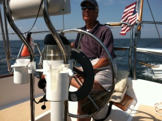 Jim takes a relaxed turn at the helm using his Sperry for hands-free steering.
